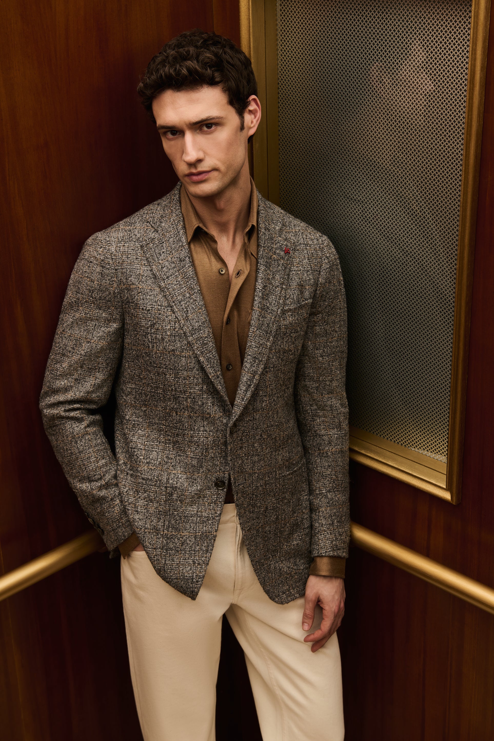 ISAIA Made to Measure: grey tweed jacket with brown shirt and cream trousers