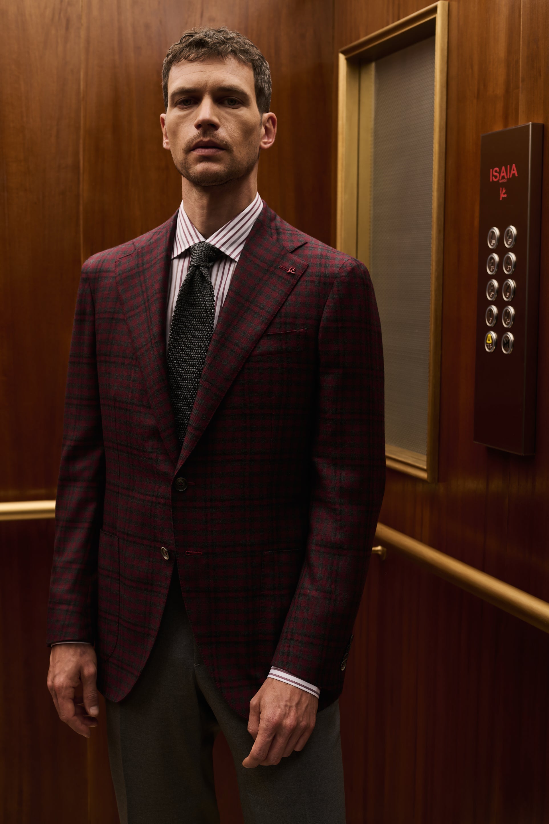 ISAIA Made to Measure: burgundy check jacket with striped shirt and dark green tie