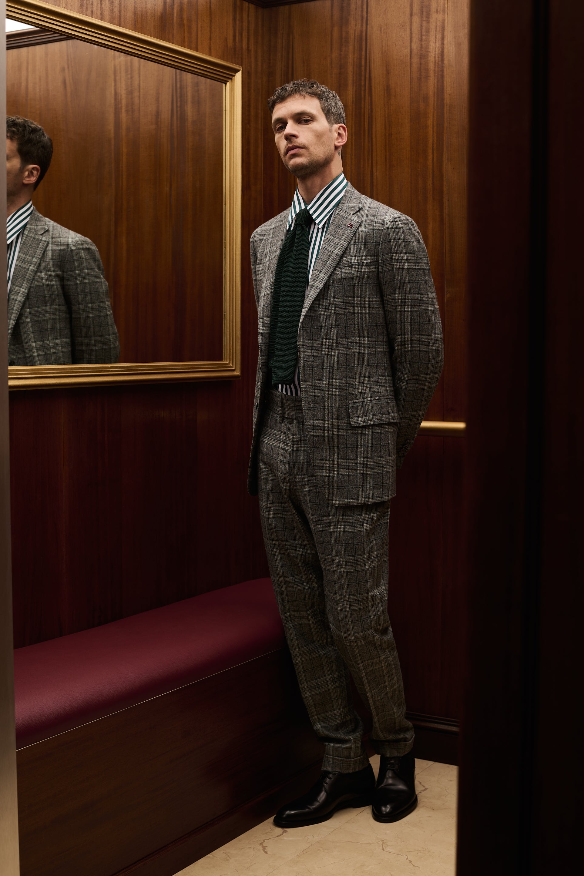 ISAIA Made to Measure: grey Prince of Wales check suit with striped shirt and dark green tie