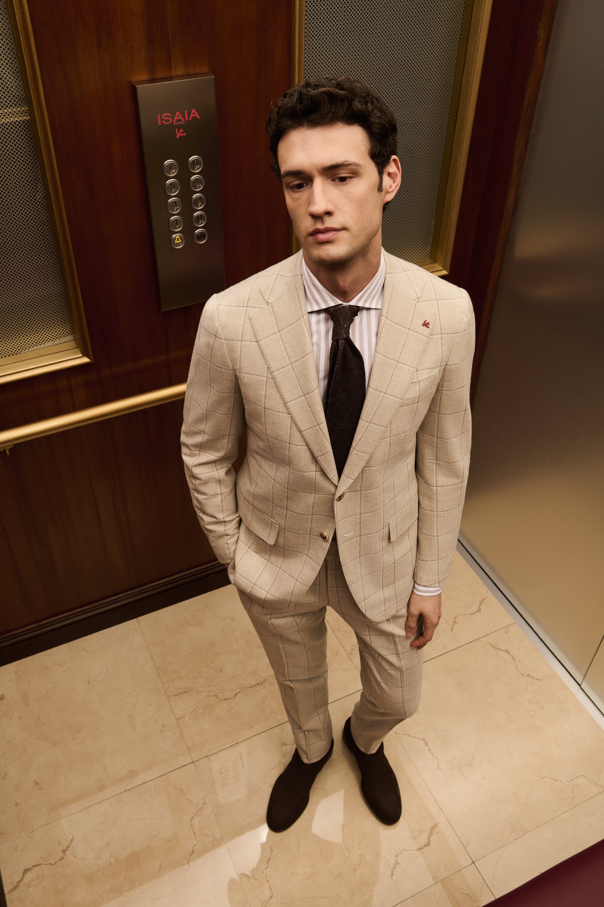 ISAIA Made to Measure: beige windowpane check suit with striped shirt and brown tie