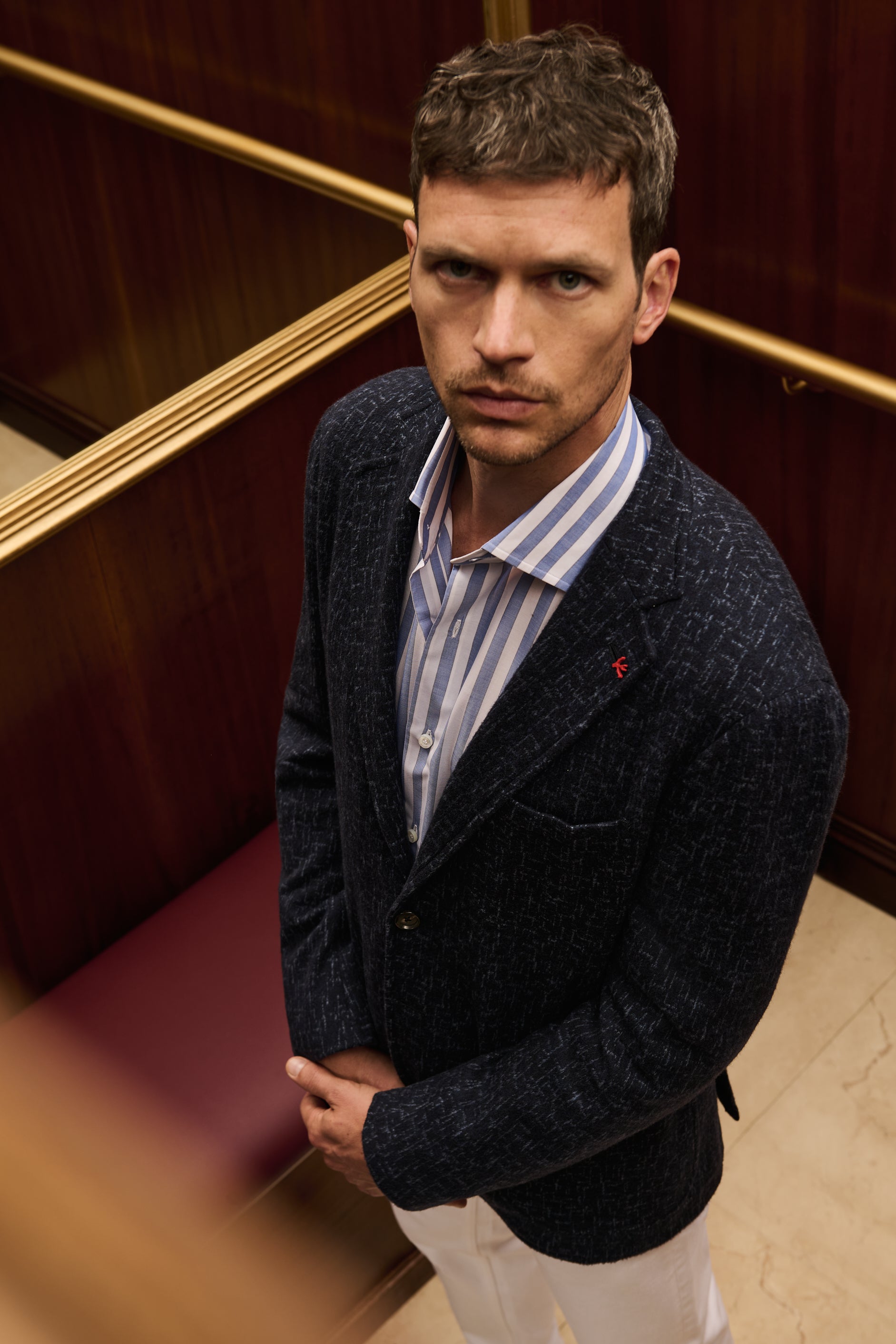 ISAIA Made to Measure: navy textured jacket with blue striped shirt and white trousers